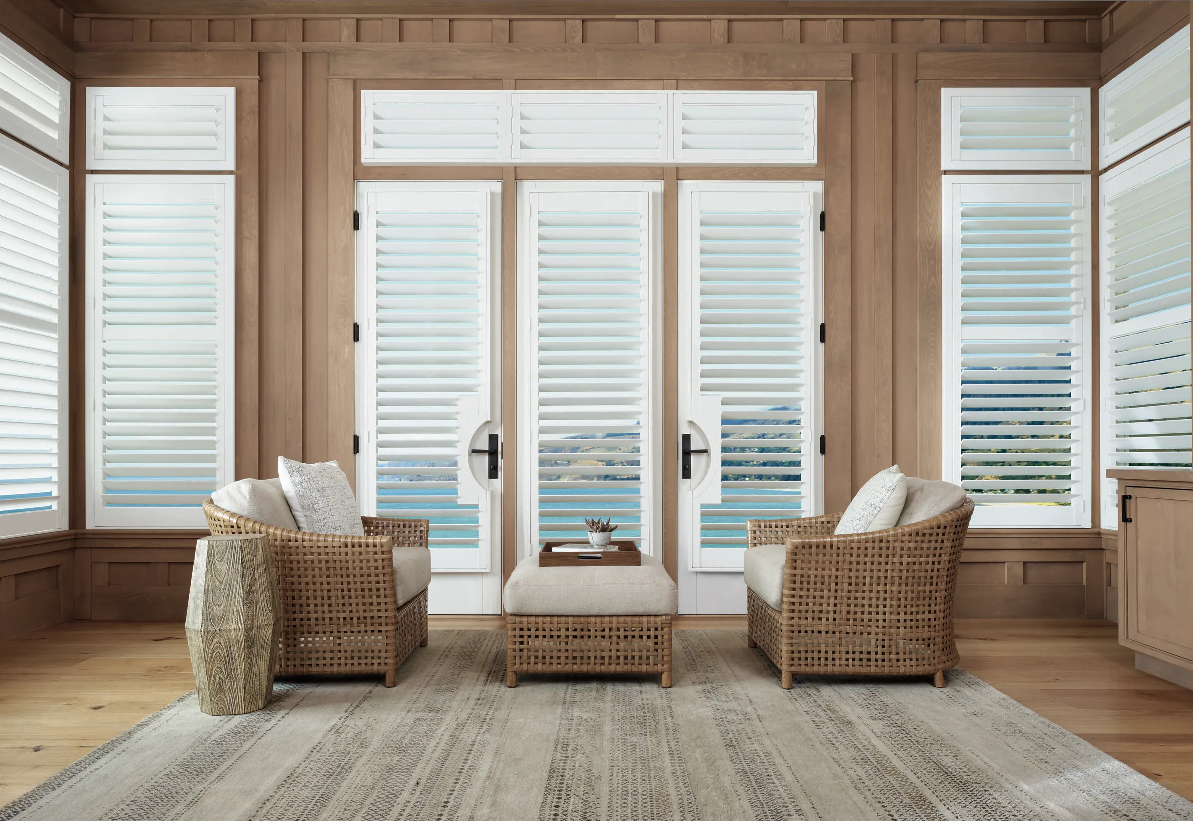 Sunroom with white interior shutters